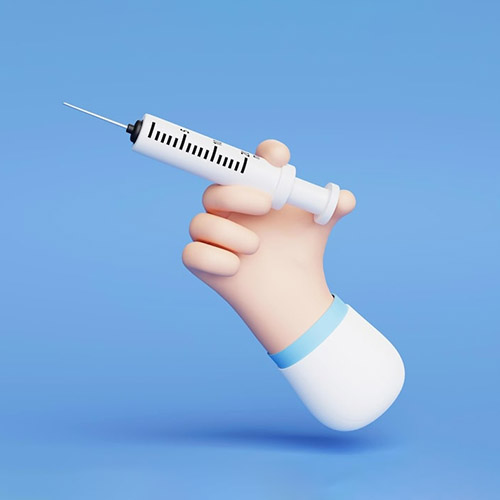 hand-holds-syringe-with-vaccine